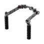 Wooden Camera 15mm LWS Handgrip Kit assembled, featuring black ODI BMX handgrips, 7075 aluminum crossbar, and foldable 6-inch extensions with color-coded rings for camera identification.