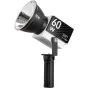 Zhiyun Molus G60 Combo 60Вт COB свет с оранжевой полосой и черной рукояткой, с мини-рефлектором сбоку.