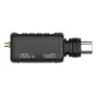 Deity THEOS DXTX Plug-on Transmitter, a wireless audio device featuring a gold XLR input, USB-C port, and antenna connector, with a textured grip and digital wireless switch.