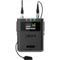 Deity DLTX phantom power bodypack transmitter with dual SMA antennas, LCD display showing time, battery status, and audio levels, and a lavalier microphone attached via cable