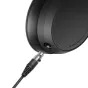 Close-up of a Sennheiser HD 480 PRO studio headphone earcup with a detachable metal cable connector plugged in, showing the black leather ear pad and model labeling.