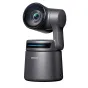 Obsbot Tail Air PowerUp Combo 4K PTZ Streaming Camera mounted on an extendable tripod, featuring a large lens with a blue LED indicator, a sleek black body, and a control panel with three illuminated blue dots. The base displays