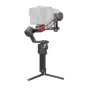 DJI RS 4 Pro gimbal stabilizer with a camera mounted, carbon fiber arm featuring Ronin branding, tripod base, and handheld control handle