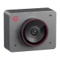 OBSBOT Meet 2 Space Grey webcam featuring a circular lens with a red accent ring, compact rectangular body, and a red logo, set against a plain white background.