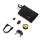 Insta360 Mic Pro Transmitter kit with graphite black wireless lavalier microphone, yellow E‑ink display, furry windscreen, USB‑C cable, and black carrying case on a white background.