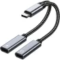 PremiumCord USB‑C 2‑in‑1 splitter ar plīša melnu kabeli, virsējais USB‑C savienotājs un divi apakšējie USB‑C porti (viens uzlādei ar zibens simbolu, otrs audio ar austiņu simbolu) alumīnija korpusā