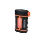 Celestron PowerTank Lithium Pro portable power bank with black cylindrical body, orange accents, illuminated red and white LED panel on front, 12 V DC and USB ports, compact for astronomy and camping