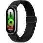 Melna plānotā neilona josla Xiaomi Smart Band 8/9, ērta un elpojoša, viegli pievienojama, elegants dizains ar digitālo displeju, kas rāda laiku 09:28 un 85% akumulatora