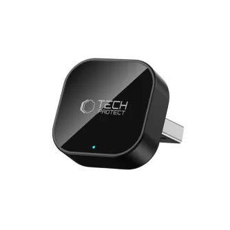 Tech-Protect bezvadu CarPlay/Android Auto adaptors, melna kompakta vienība ar spīdīgu virsmu, zils LED indikators iedegts, USB spraudnis redzams, gatavs lietošanai.