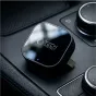 Tech-Protect CA01 беспроводной адаптер CarPlay и Android Auto, черный матовый квадратный блок с глянцевой крышкой, логотипом и синим индикатором, расположен на центральной консоли автомобиля рядом с регуляторами