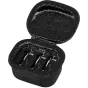 Open black zippered Rode Wireless GO Charge Case+ with foam interior holding two transmitters and one receiver for simultaneous charging.