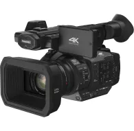 Melnais Panasonic HC‑X1 profesionālais kamežs ar Leica Dicomar 20× optiskā zooma objektīvu, 3,5 collu rotējamu skārienekrānu un sānu vadības paneli.Melnais Panasonic HC‑X1 profesionālais kamežs ar Leica Dicomar 20× optiskā zooma objektīvu, 3,5 collu rotējamu skārienekrānu un sānu vadības paneli.