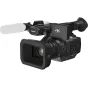 Black Panasonic HC-X1 professional 4K camcorder with Leica Dicomar 20x zoom lens, 5-axis hybrid image stabilization, dual SD card slots and 3.5-inch rotatable touchscreen, white shotgun microphone attached.