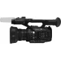 Panasonic HC‑X1 black professional 4K camcorder with Leica 20× optical zoom lens, top view showing handgrip, control panel and attached shotgun microphone