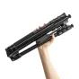 Hand holding a compact black Fotopro A4i video tripod with MH-2A fluid head, showing folded aluminum legs and quick-flip locks.