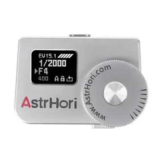 Sudraba AstrHori AH-M1 gaismas mērītājs ar OLED ekrānu, kas rāda EV15.1, 1/2000 s, F4, un lielu regulēšanas disku ar www.AstrHori.com