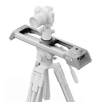 White Zeapon Evo D40 motorised slider mounted on a tripod with a camera attached, featuring measurement markings and a control panel with buttons and a green indicator light.