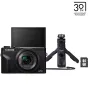 Melna Canon PowerShot G7 X Mark III Vlogger KIT kompaktā kamera ar izklājamo ekrānu, pievienoto statīvu un bezvadu tālvadības pulti, kā arī 64 GB SD karti