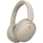 Beige Sony WH-CH730N wireless headphones, side view with foldable design, Dual Noise Sensor active noise cancellation and microphone grille.