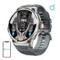Colmi V69 sudra smartājas ar melnu silikonu strapu, 1,85‑polzu HD ekrānu, kas parādītas laiks, pulss, akuma un weather, pie COLMI smartfonu ikonas, kas norāda Bluetooth saviesu.