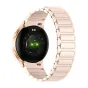 Zelta Colmi i28 Ultra smartwatch ar magnetiski jebā, atpakaļ redzams sirds pulssensore ar zaļām diodām, IP68 aizvietotspēja