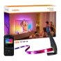 Lepro STV1 Wi‑Fi LED strip kit, 5 m RGB backlight with camera and smartphone app, displayed with packaging, strip, camera and phone controlling dynamic TV lighting for a family watching a colorful screen