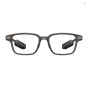 Front view of EVEN REALITIES G2B AR glasses with a brown frame, black binocular Micro LED display modules inside the lenses, and titanium temple accents, shown on a white background.