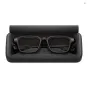 Top view of EVEN REALITIES G2B AR glasses with a brown frame inside an open black charging case, highlighting the lightweight design and binocular micro LED display.