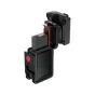JJC SSK OA6 ScoutSnap Kit handle with magnetic quick‑release, adjustable shutter adapter and open battery compartment, showing battery insertion and aluminium cage for DJI Osmo Action 6