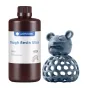 ANYCUBIC Tough Resin Ultra zils 1 kg bēzlīdz ar zilu 3D‑printētu medaļu ar medaļu ēksprezes, kas parādina elastisku un aiztūstamu fotopolimeru resinu LCD/DLP 3D printers.