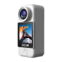 White SJCAM C300 Pocket Action Camera with a circular lens on top, a 1.3‑inch touchscreen showing a skier on a snowy mountain, SJCAM logo below, gray side panel and a circular button at the bottom.