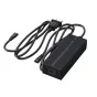 UNITREE Go2 Fast Charger с черным ребристым корпусом, прикрепленным кабелем с вилкой типа США и DC разъемом, расположен на чистом белом фоне.